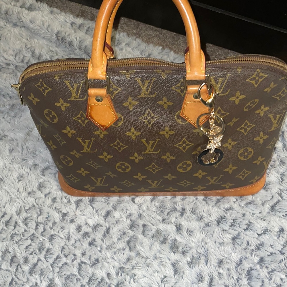Authentic Louis Vuitton Alma PM (with unbranded purse charm)